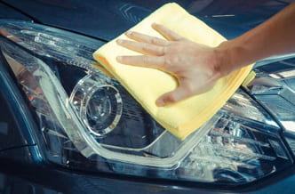 Headlight Restoration Service in Progress on a Car in Brisbane